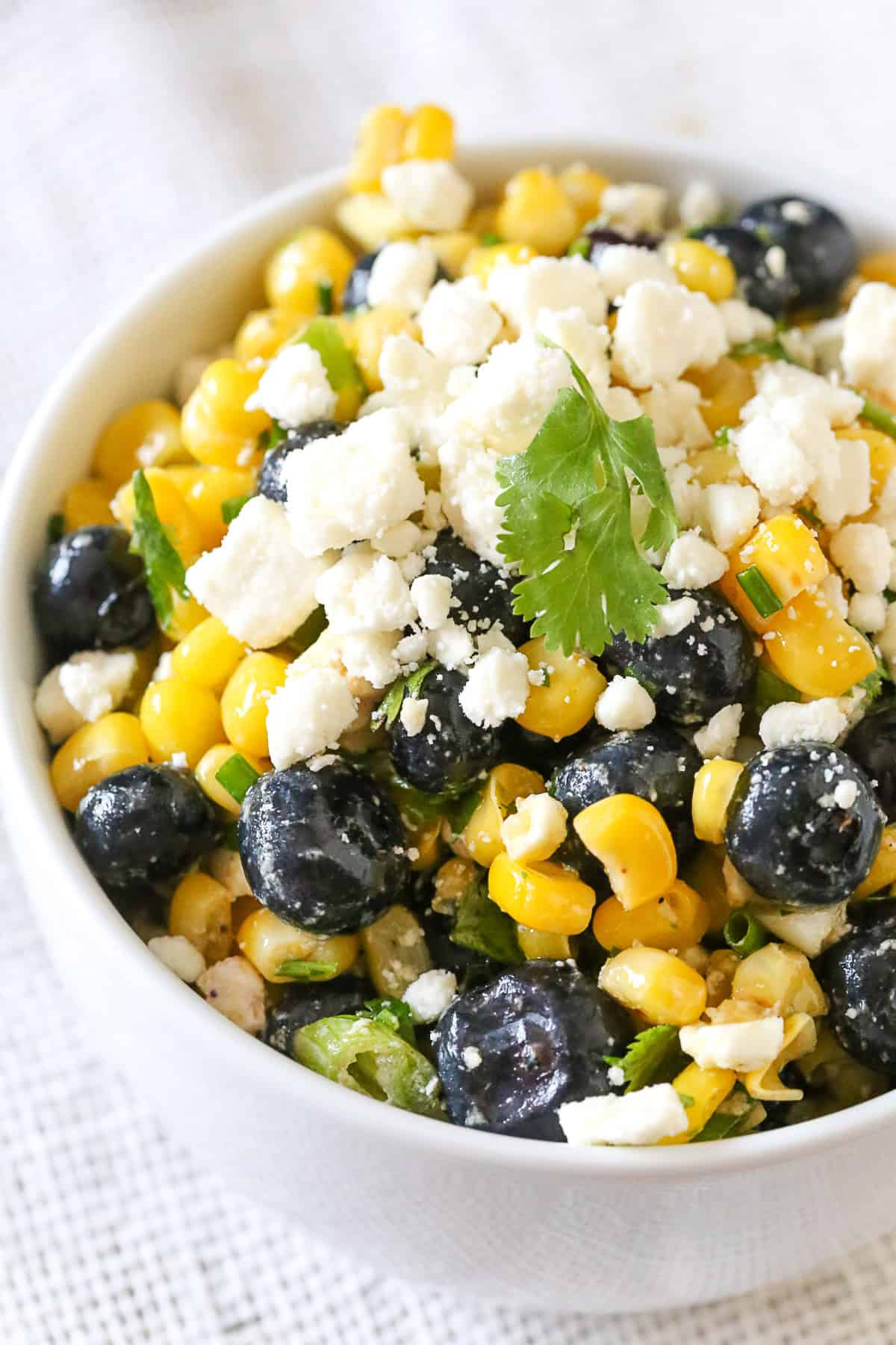blueberry corn salad in a bowl. 