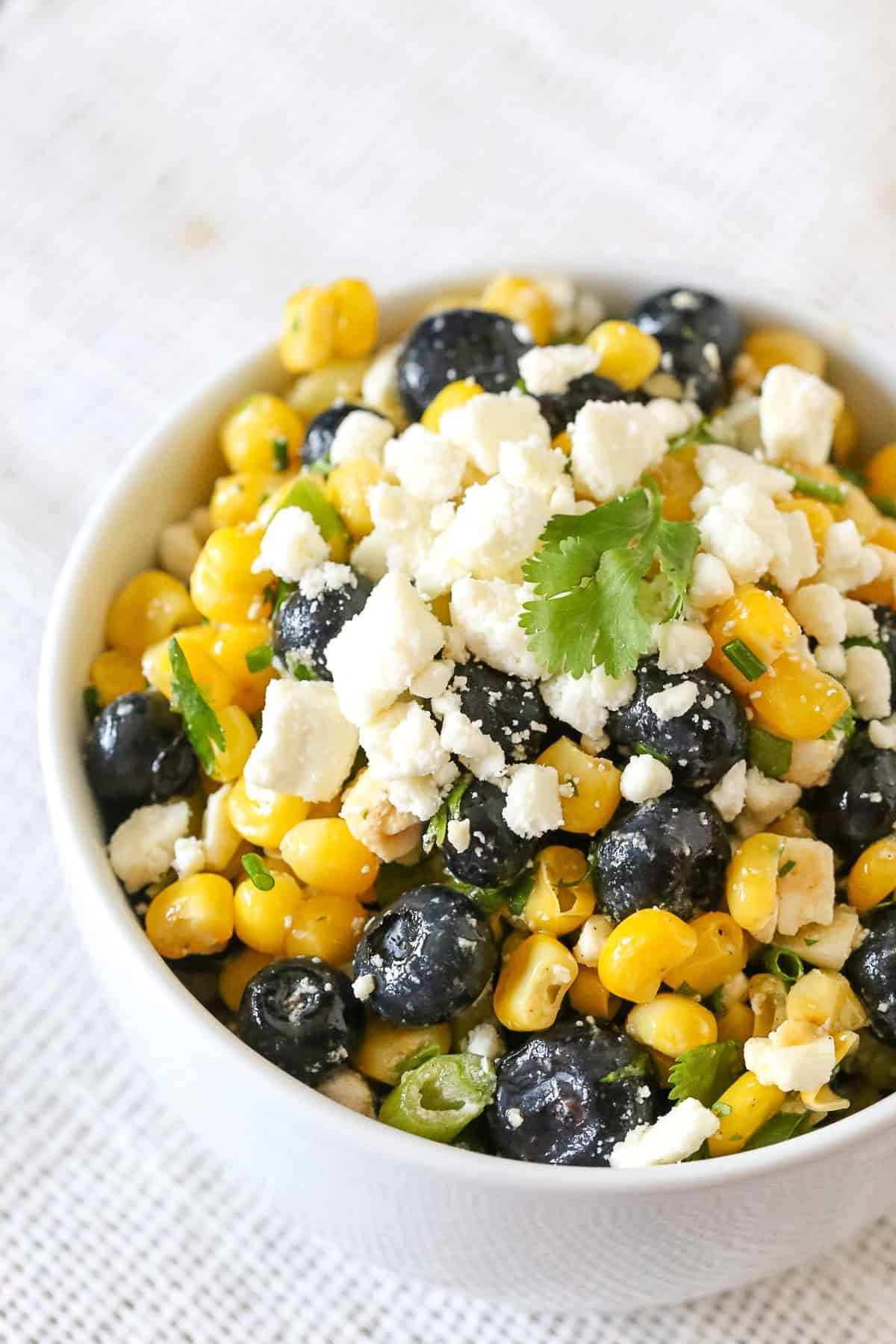 blueberry corn salad in a bowl. 
