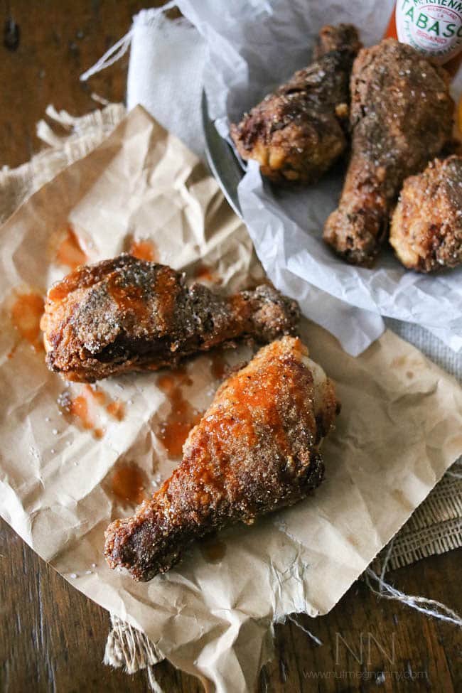 Gluten free spicy friend chicken never tasted so good! Made using Pamela's Products gluten free flour and lots of hot sauce. So crispy and oh so delicious! 
