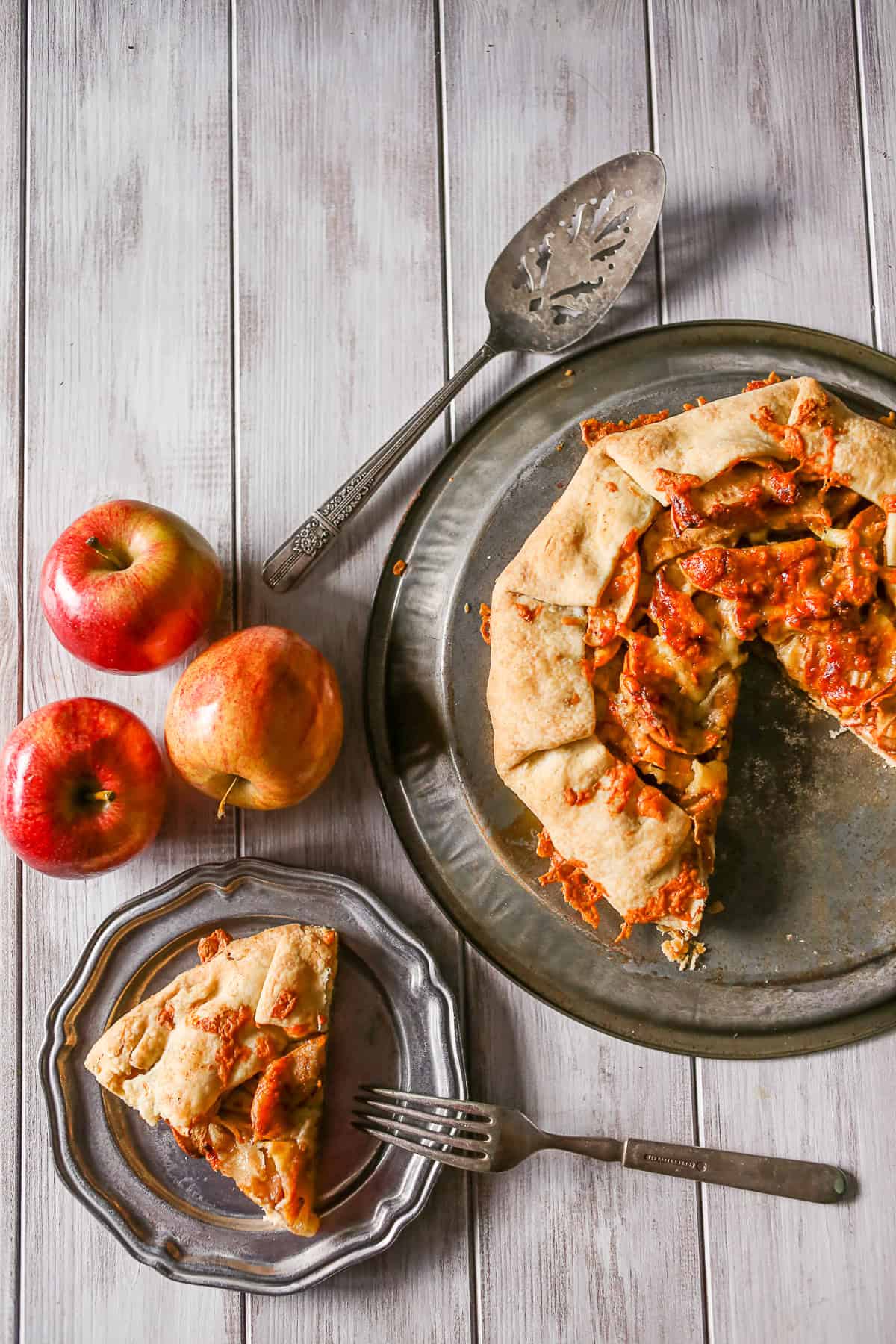 Apple Cheddar Galette sliced on a plate. 