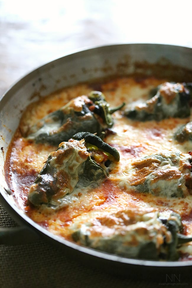 Chorizo Stuffed Poblano Peppers covered in cheese. 