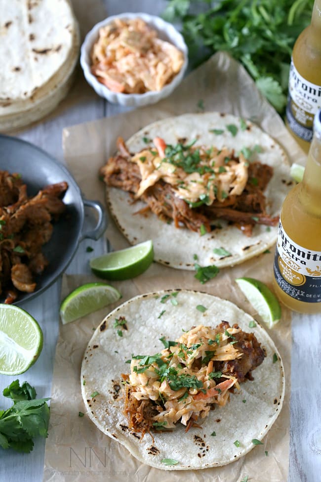 Ginger Beer Pulled Pork Tacos on a plate. 