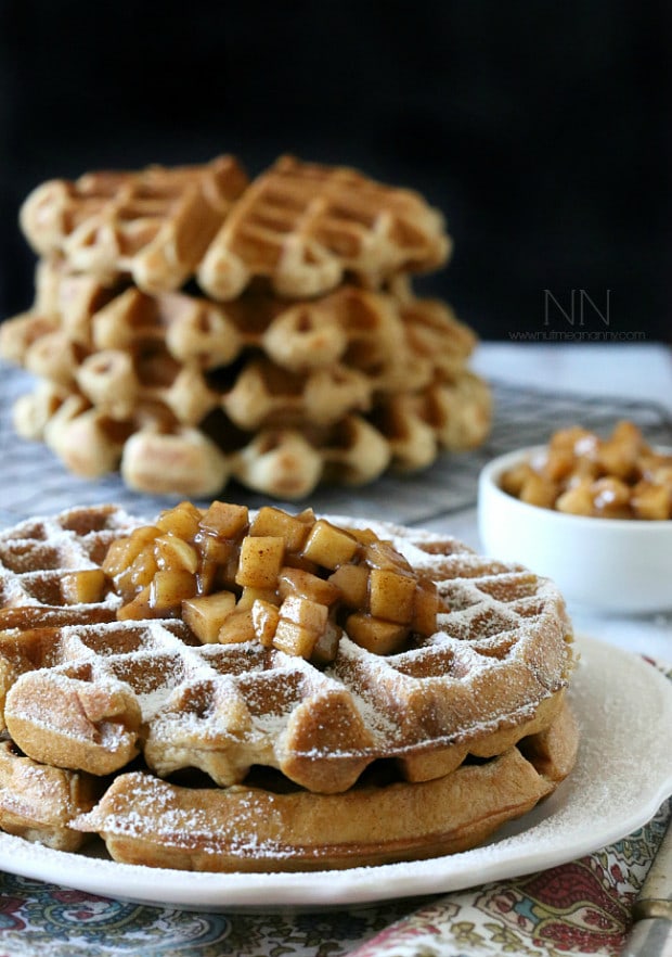 These gluten free apple cinnamon waffles are packed full of warm cinnamon apples and packed into an easy gluten free waffle recipe. This is the perfect way to start the day!