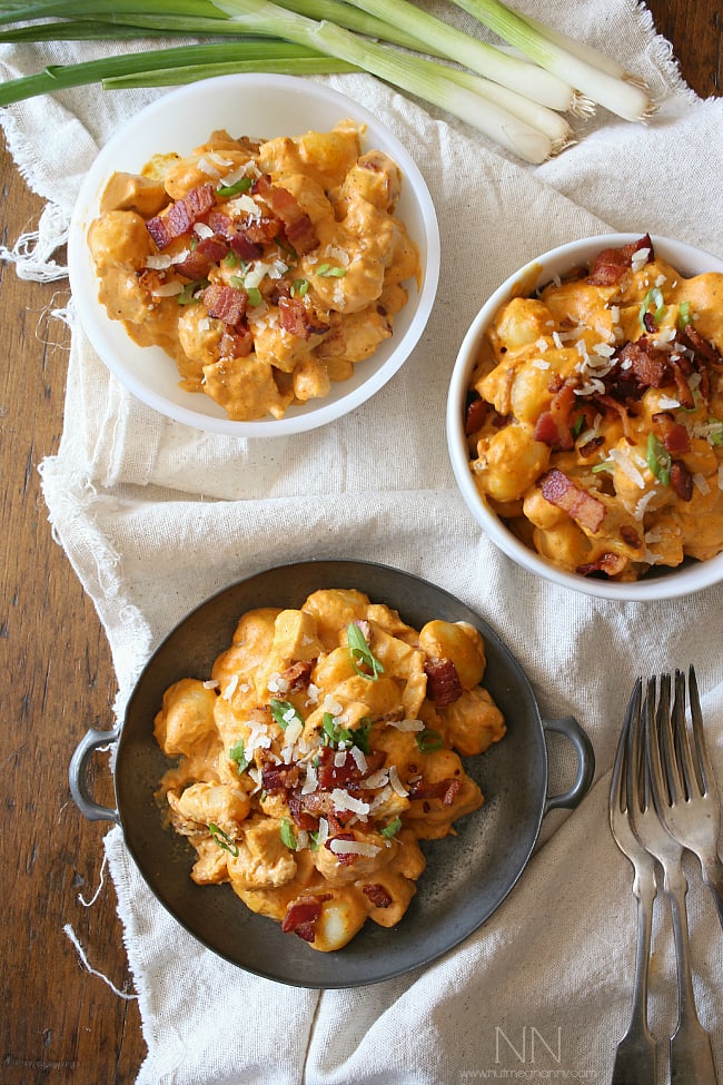 Chicken Bacon Pumpkin Gnocchi topped with green onions. 