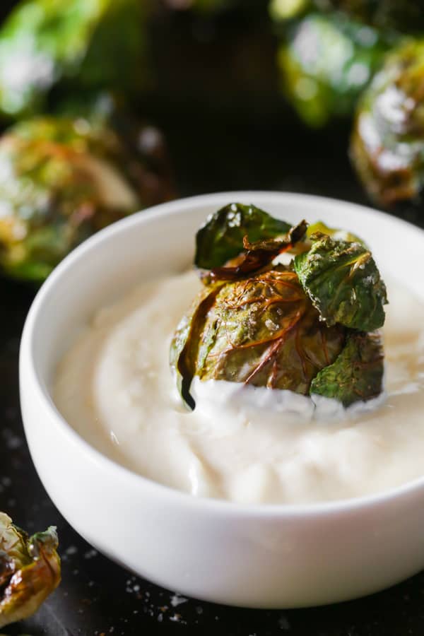 on the stalk roasted brussels sprouts dipped in garlic mayonnaise