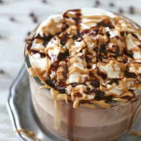 This rich and creamy peanut butter hot chocolate is perfect for keeping you warm all winter long. Plus it's super simply because it's made in your blender! That's right. I made this delicious treat right in my Vitamix!