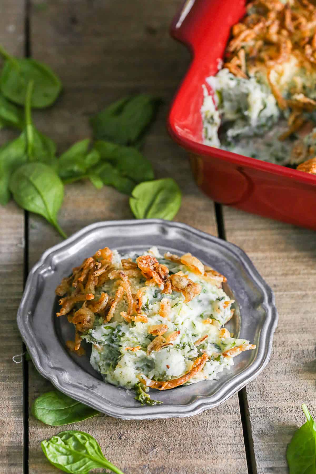 Spinach Parmesan Baked Mashed Potatoes on a small metal plate. 