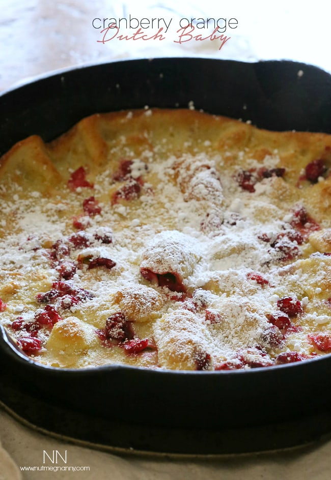This cranberry orange Dutch baby is the highlight of your holiday season eating. Full of tart fresh cranberries and zesty orange flavor. Say hello to delicious! This cranberry orange Dutch baby is the highlight of your holiday season eating. Full of tart fresh cranberries and zesty orange flavor. Say hello to delicious!