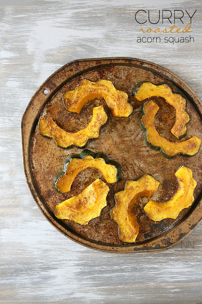 This simple curry roasted acorn squash is the perfect easy Thanksgiving side dish. Packed full of flavor and ready in under 30 minutes!