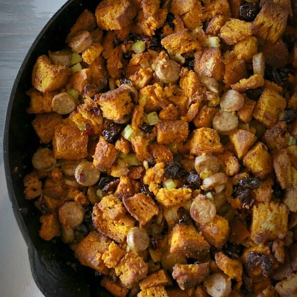 This pumpkin cornbread chicken sausage stuffing is packed full of homemade pumpkin sage cornbread croutons, chicken sausage and dried cherries. Perfect for Thanksgiving!