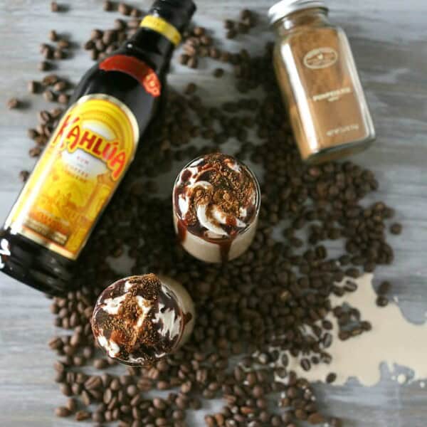 This pumpkin spice white Russian is full of kahlua, cream, pumpkin pie spice and just a drizzle of chocolate syrup. This is the perfect fall cocktail!
