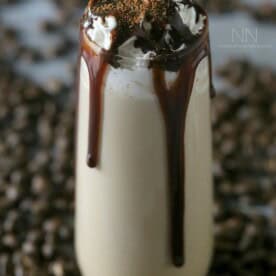 This pumpkin spice white Russian is full of kahlua, cream, pumpkin pie spice and just a drizzle of chocolate syrup. This is the perfect fall cocktail!
