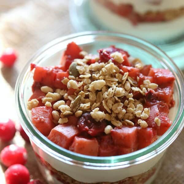 These cranberry apple yogurt parfaits are the perfect addition to your holiday breakfast menu. Easy to make and full of fresh fruit, crunchy granola and tangy Greek yogurt.