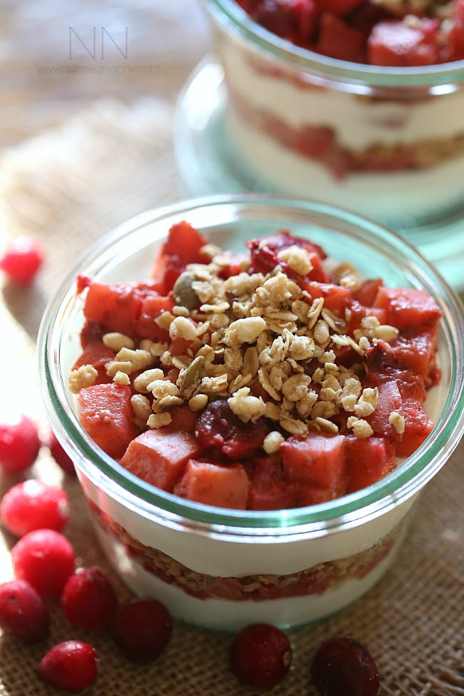 These cranberry apple yogurt parfaits are the perfect addition to your holiday breakfast menu. Easy to make and full of fresh fruit, crunchy granola and tangy Greek yogurt. 