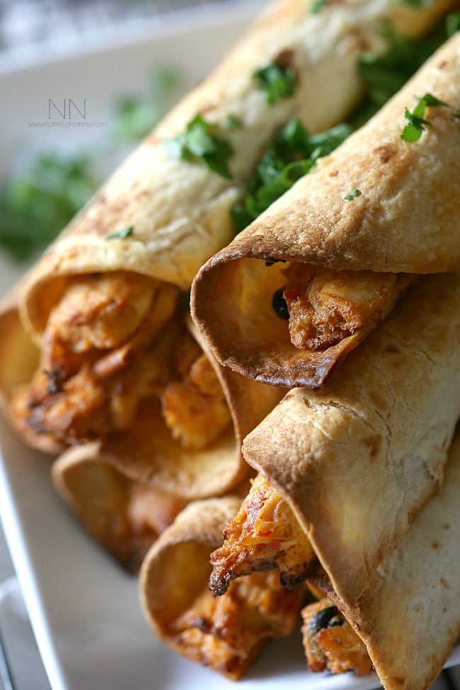 Creamy Chicken Taquitos on a platter. 