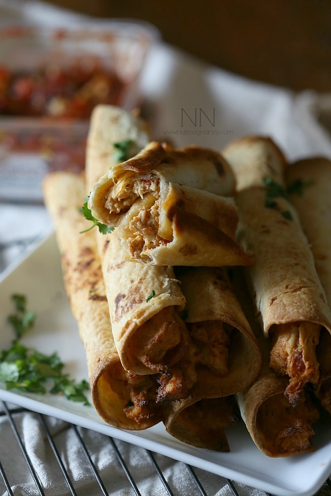 Creamy Chicken Taquitos cut in half. 