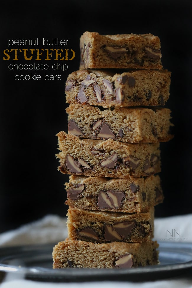 These peanut butter stuffed chocolate chip cookie bars are  bursting with lots of peanut butter deliciousness. Serve warm with a big glass of cold milk. 