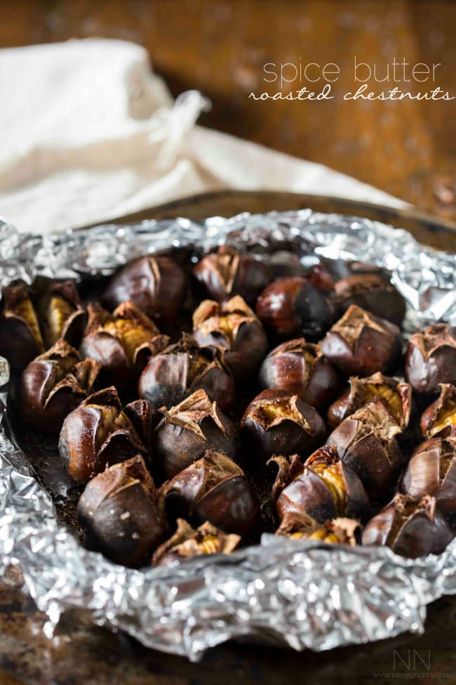 Spice Butter Roasted Chestnuts on a sheet pan wrapped in foil. 