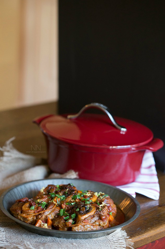 This homemade veal osso buco is the perfect holiday meal. Made with tomatoes, fresh herbs, a touch of white wine and a sprinkling of lemon zest. 