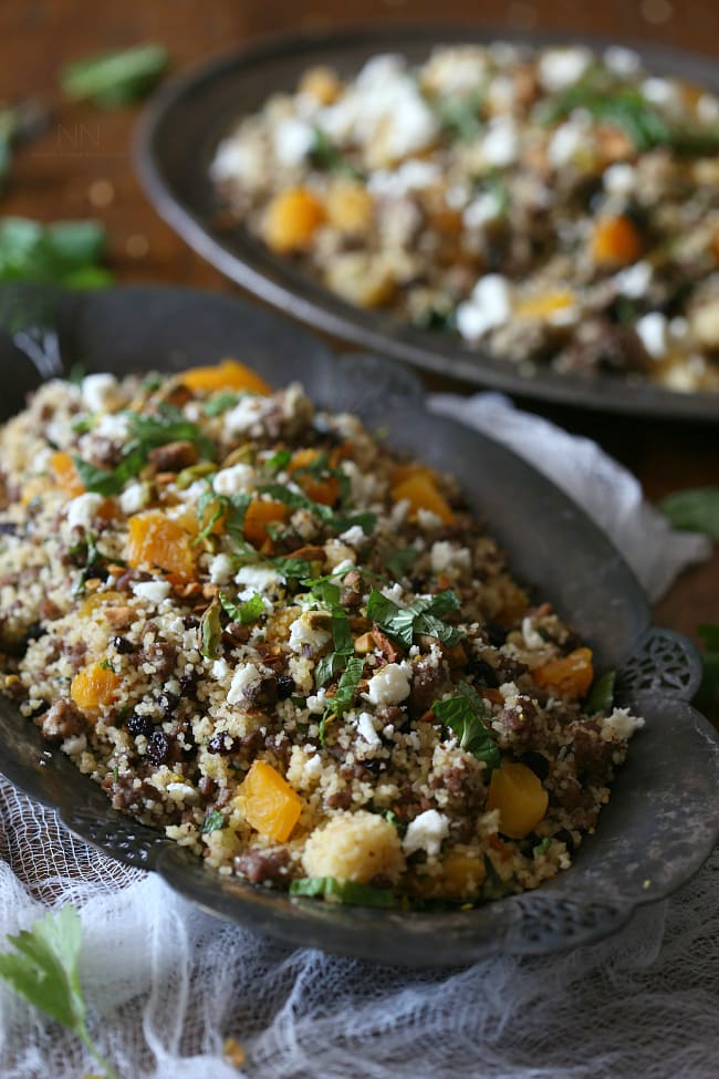 Moroccan Lamb Couscous topped with fresh mint. 