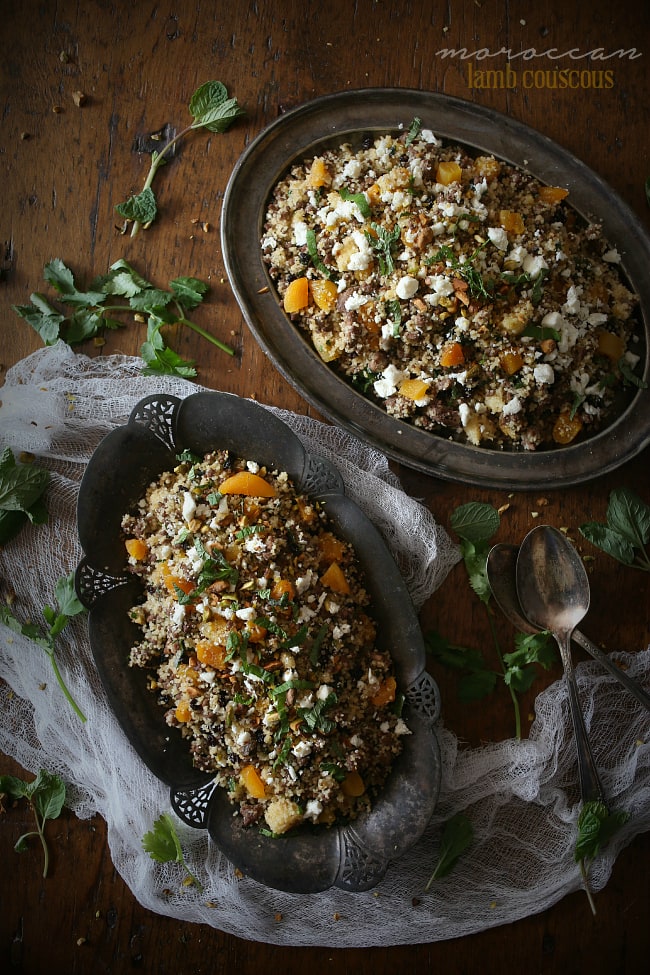 Moroccan Lamb Couscous on 2 serving dishes. 