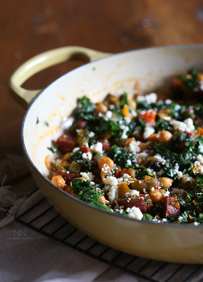 This chorizo chickpea skillet is packed full of spicy chorizo sausage, chickpeas, kale, sweet bell peppers and cotija cheese. Full of flavor, nutritious vegetables and perfect for cold winter days. This chorizo chickpea skillet is packed full of spicy chorizo sausage, chickpeas, kale, sweet bell peppers and cotija cheese. Full of flavor, nutritious vegetables and perfect for cold winter days.