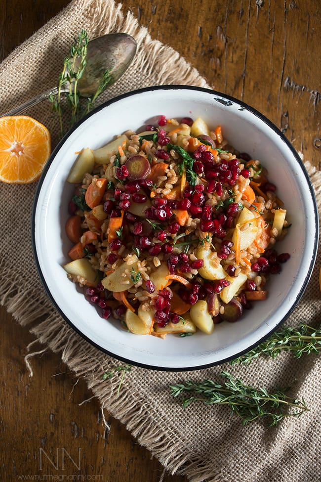This farro carrot pomegranate salad is the perfect healthy side dish. It's packed full of vegetables and dressed with a simple squeeze of orange.