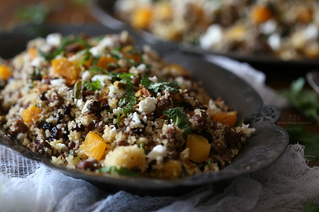Moroccan Lamb Couscous in a metal serving dish. 