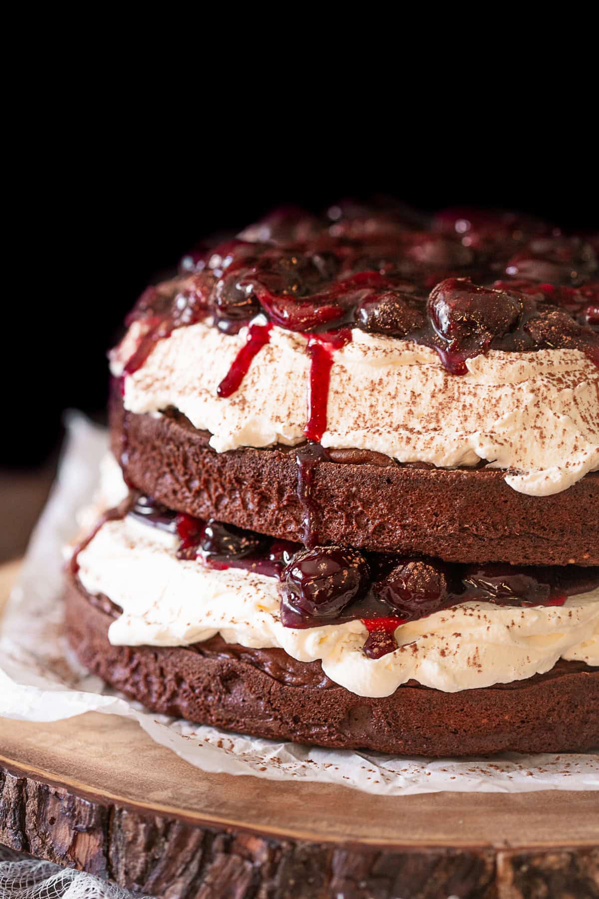  Black Forest Cake layered on a cake platter. 