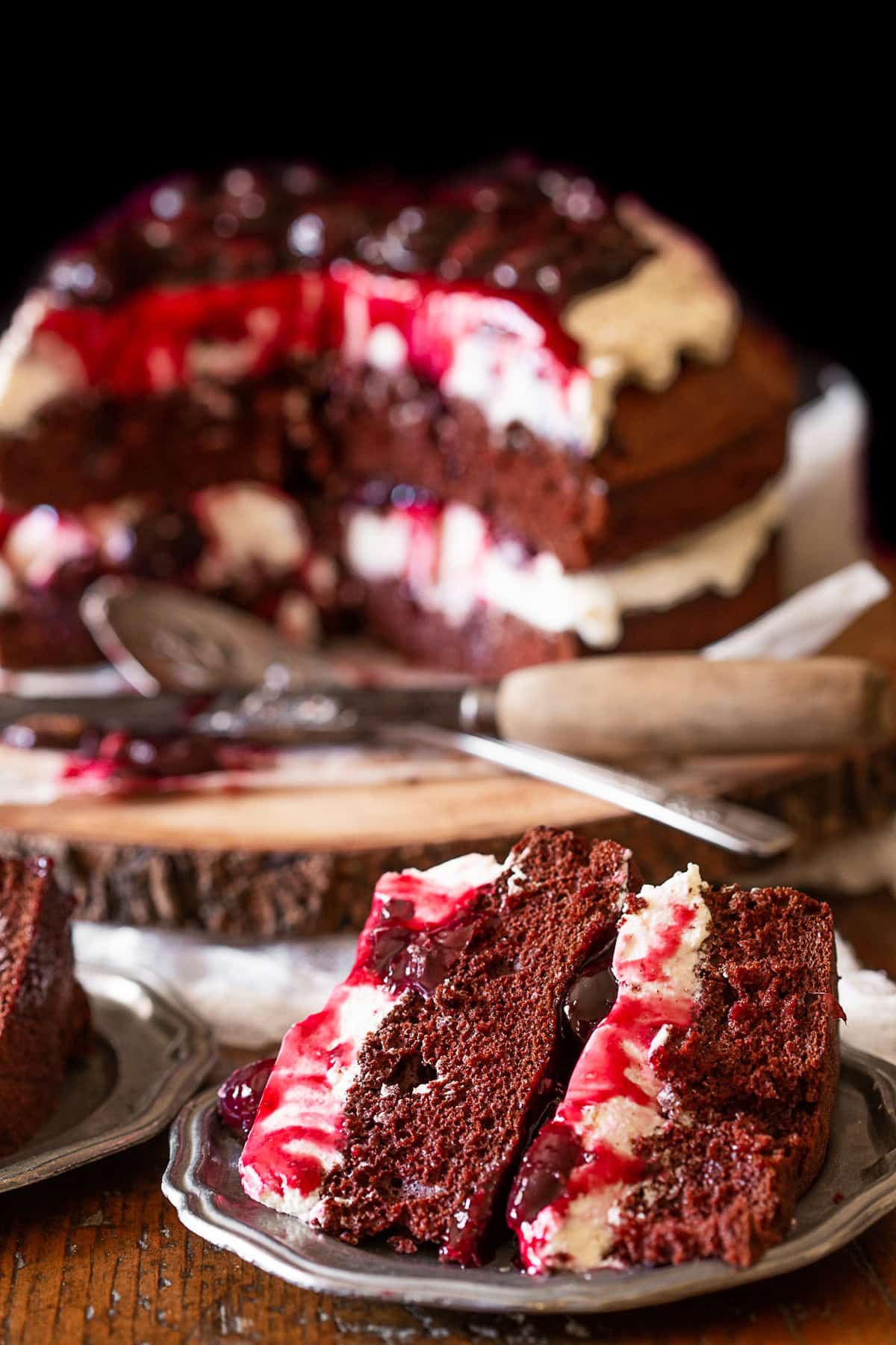 Black Forest Cake slice on a pewter plate. 