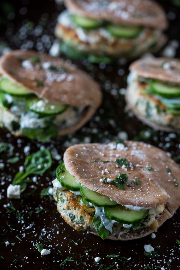 4 chicken souvlaki burgers stuffed with cucumbers in a pita pocket bun