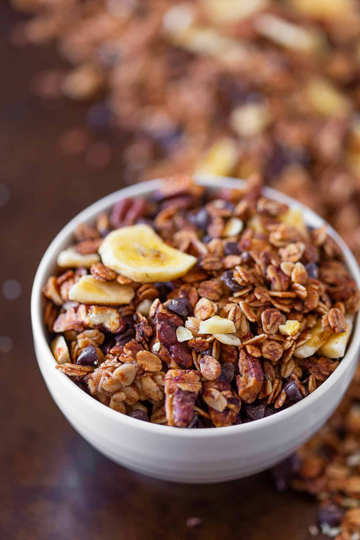 Banana Bread Granola in a white bowl.