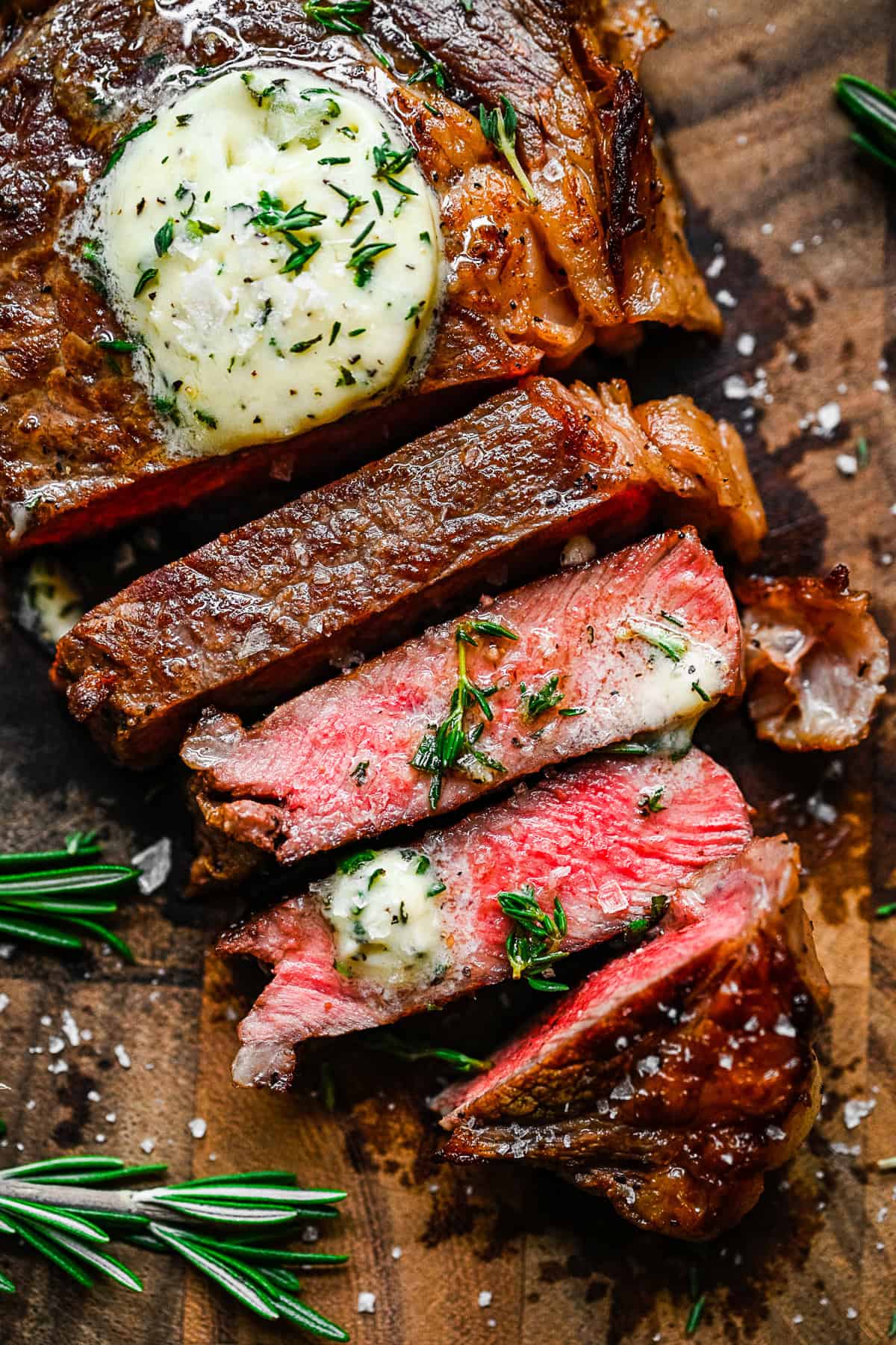 Pan Fried Ribeye sliced and rubbed with compound butter. 