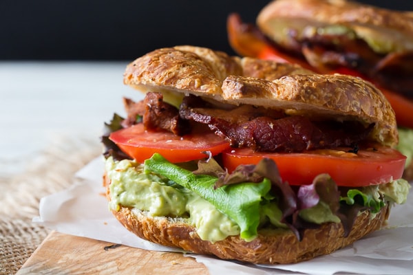 Avocado Egg Salad BLT on a roll with crispy bacon. 