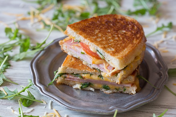 This totally cheesy Canadian BLT Grilled Cheese is stuffed with cheese, arugula, tomato and Canadian bacon. It's toasted till perfection and ready in no time!