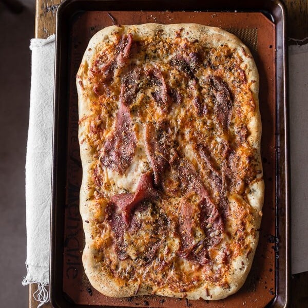 This delicious parmesan prosciutto pizza is packed full of flavor and ready in just 30 minutes. Why order take out when you can easily make it at home? Super simple and super delicious!