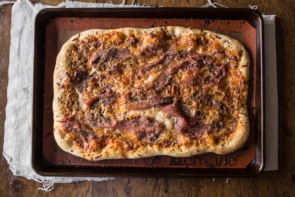 This delicious parmesan prosciutto pizza is packed full of flavor and ready in just 30 minutes. Why order take out when you can easily make it at home? The best part is that it's super simple and super delicious!