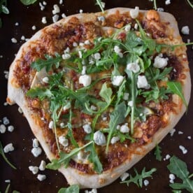 This apple butter blue cheese pancetta pizza is the perfect addition to your weeknight menu. It's sweet, savory and oh so delicious. Plus it's ready in only 30 minutes!