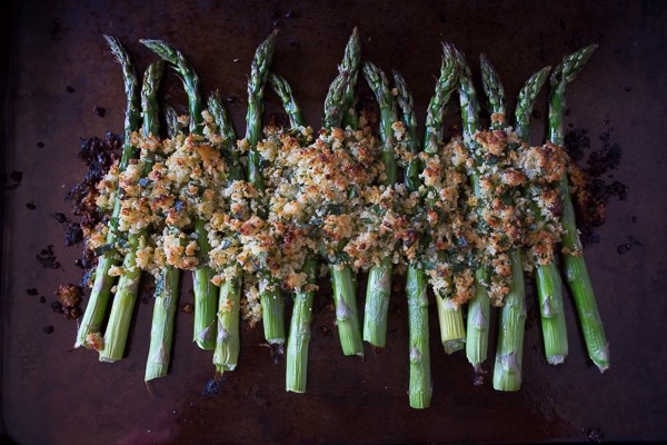 This asparagus gratin takes fresh asparagus and tops it with zesty lemon, herb and sharp Parmesan cheese panko bread crumbs. This side dish is spring time perfection.