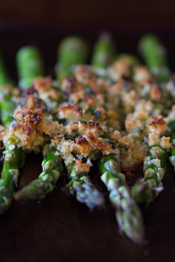 This asparagus gratin takes fresh asparagus and tops it with lemon, herb and sharp Parmesan cheese panko bread crumbs. This side dish is spring time perfection.
