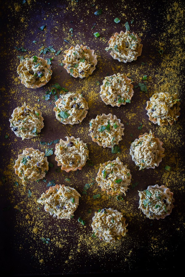 These little curried chicken salad phyllo cups are packed full of Greek yogurt, curry spice, cilantro and green onions. Then it's all packed into a crunchy phyllo cups for the perfect party appetizer. Plus they are ready in under 30 minutes!