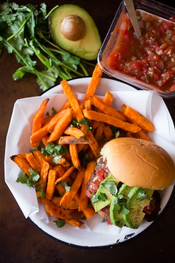 This cheesy salsa burger is perfect for your Cinco de Mayo celebration. This baby is packed full of flavor and lots of Sabra salsa. This is one packed burger!