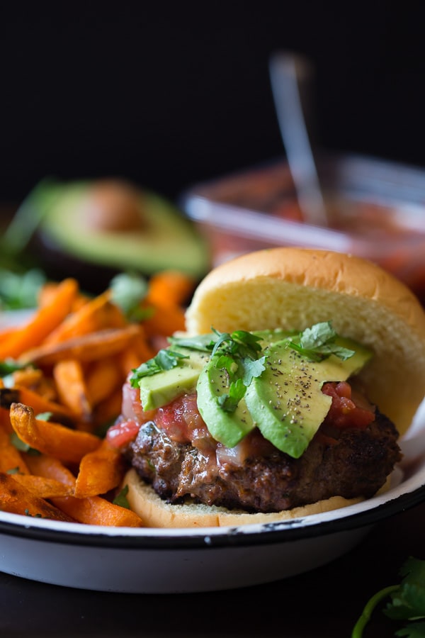 This cheesy salsa burger is perfect for your Cinco de Mayo celebration. This baby is packed full of flavor and lots of Sabra salsa. This is one packed burger!