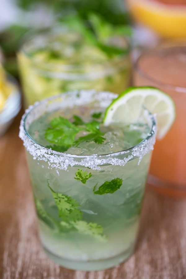 This cilantro margarita is perfect for cinco de mayo or any day of the year. Perfectly sweet with a fresh burst of lime and a hint of fresh cilantro.
