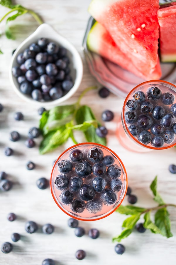 This watermelon blueberry mint spritzer is the perfect Memorial Day cocktail. Fruity watermelon mixed with fresh mint, blueberries and a touch of Truvia.