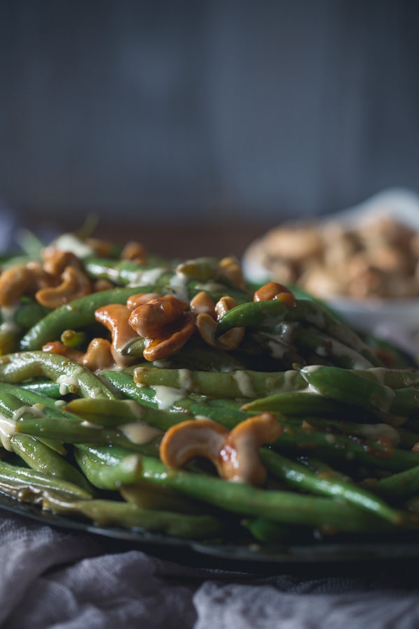 Girl and the Goat Magic Beans drizzled with aioli.