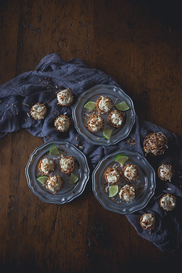 No Bake Coconut Lime Cheesecake Bites served with extra toasted coconut. 