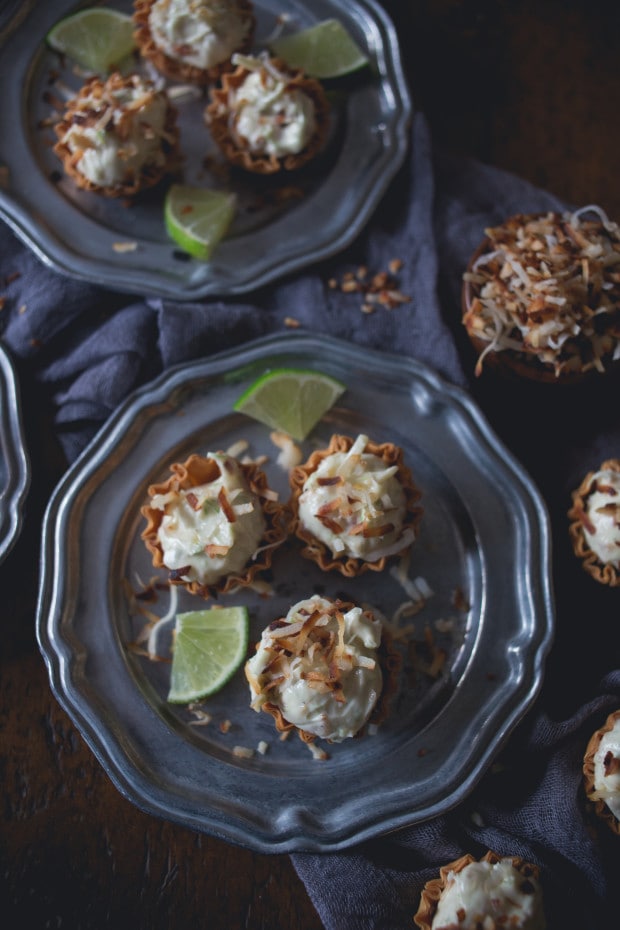 No Bake Coconut Lime Cheesecake Bites on a metal plate. 