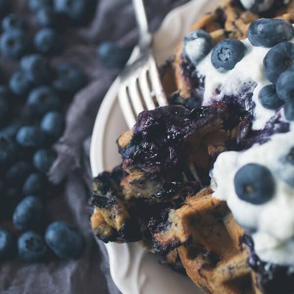 These blueberry zucchini oat waffles are the perfect way to use up those summer vegetables and fruit. Plus you can make oat flour right in your Vitamix!