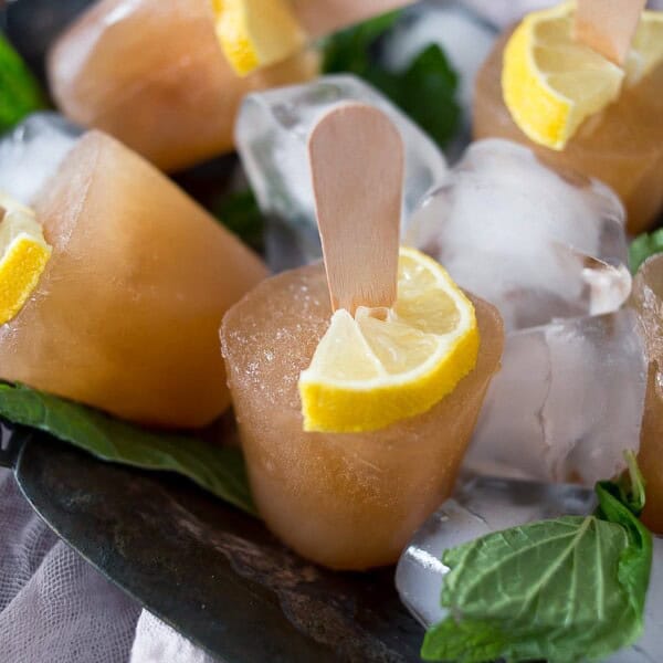 These sweet tea popsicles are the perfect way to enjoy summer. We froze up Southern sweet tea flavored with lemon and mint to create the perfect dessert.
